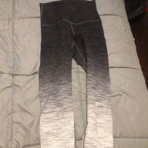 Black/white/gray hi-rise lululemon leggings. Lightly used. Size 12.